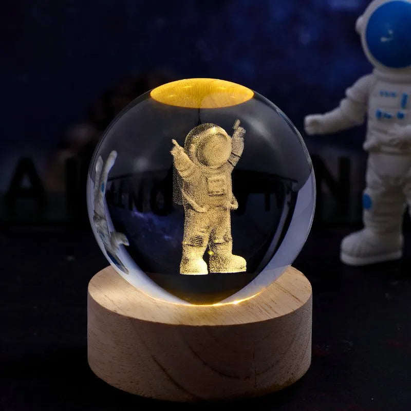 Szklana kula z astronautą
